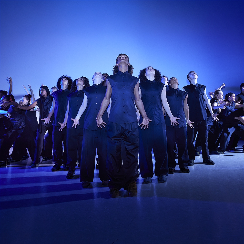 Dance students gathering in a condescending formation during a national winning choreography at nationals.